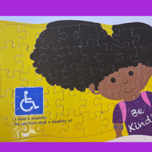 Puzzle with child, disability symbol, and message.